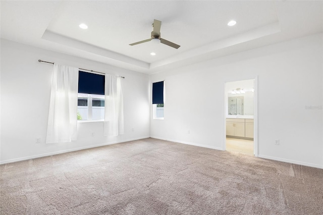 12216 Encore At Ovation Way, Winter Garden, FL 34787 - carpeted empty room featuring a tray ceiling, a ceiling fan, and recessed lighting