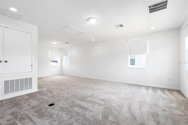 12216 Encore At Ovation Way, Winter Garden, FL 34787 - spare room with carpet floors, attic access, and recessed lighting