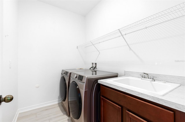 12216 Encore At Ovation Way, Winter Garden, FL 34787 - washroom featuring washer and clothes dryer and cabinet space