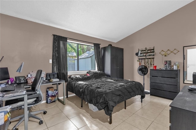 2728 Tally Ho Ave 2722, 2724, 2726, Orlando, FL 32826 - bedroom with light tile patterned floors, a desk, and lofted ceiling