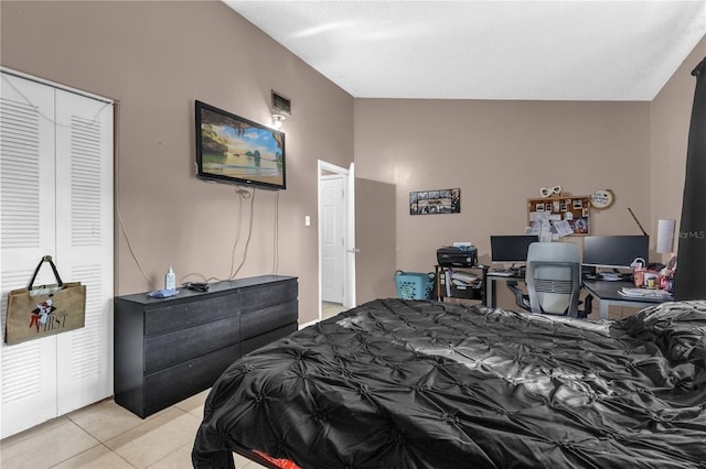 2728 Tally Ho Ave 2722, 2724, 2726, Orlando, FL 32826 - bedroom featuring light tile patterned flooring, an office area, and a closet