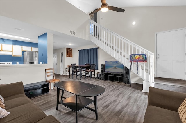 2728 Tally Ho Ave 2722, 2724, 2726, Orlando, FL 32826 - living room with stairs, wood finished floors, ceiling fan, a high ceiling, and recessed lighting