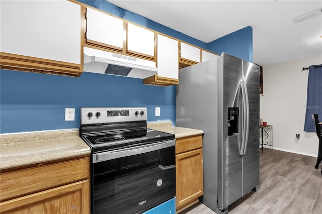 2728 Tally Ho Ave 2722, 2724, 2726, Orlando, FL 32826 - kitchen featuring black electric range, under cabinet range hood, stainless steel refrigerator with ice dispenser, light countertops, and light wood-type flooring