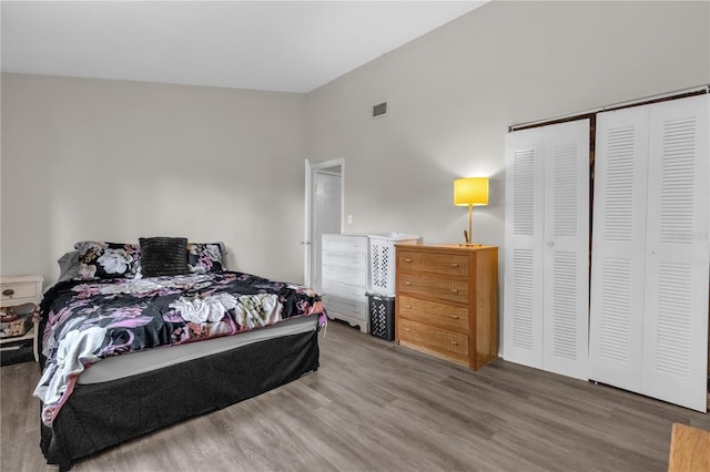 2728 Tally Ho Ave 2722, 2724, 2726, Orlando, FL 32826 - bedroom featuring wood finished floors and a closet