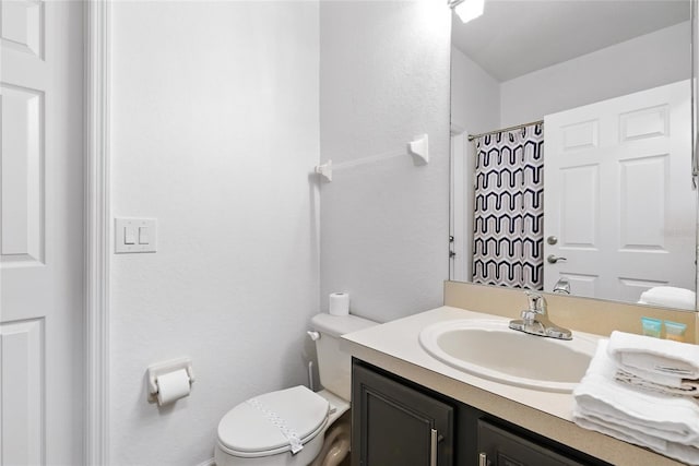 814 Calabria Ave, Davenport, FL 33897 - full bathroom featuring vanity and toilet