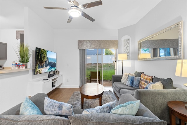 814 Calabria Ave, Davenport, FL 33897 - living room featuring dark wood-type flooring and ceiling fan