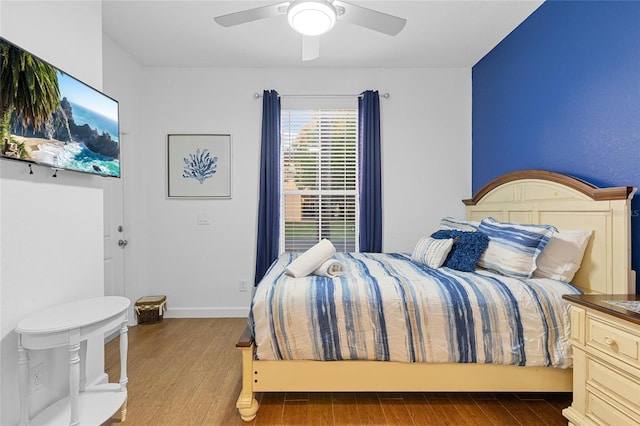 814 Calabria Ave, Davenport, FL 33897 - bedroom featuring wood finished floors and ceiling fan
