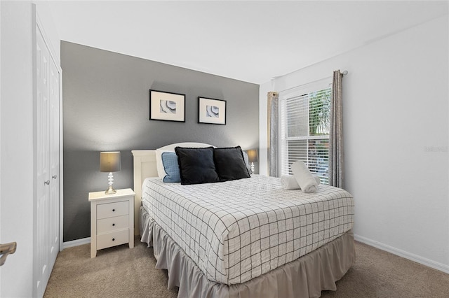 814 Calabria Ave, Davenport, FL 33897 - carpeted bedroom with baseboards and a closet