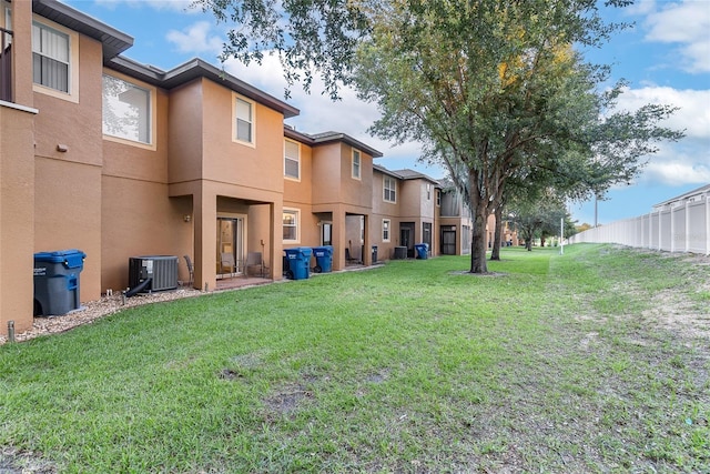 814 Calabria Ave, Davenport, FL 33897 - back of house featuring stucco siding