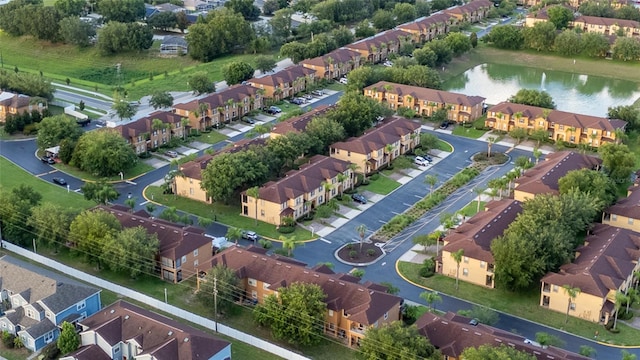814 Calabria Ave, Davenport, FL 33897 - aerial view of residential area featuring a nearby body of water