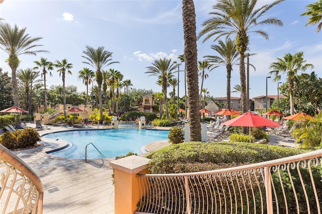 814 Calabria Ave, Davenport, FL 33897 - community pool with a patio