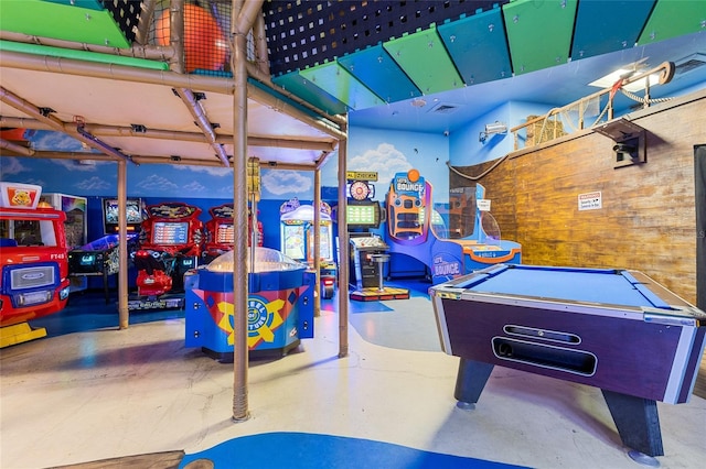 814 Calabria Ave, Davenport, FL 33897 - rec room featuring pool table, wood walls, and concrete flooring