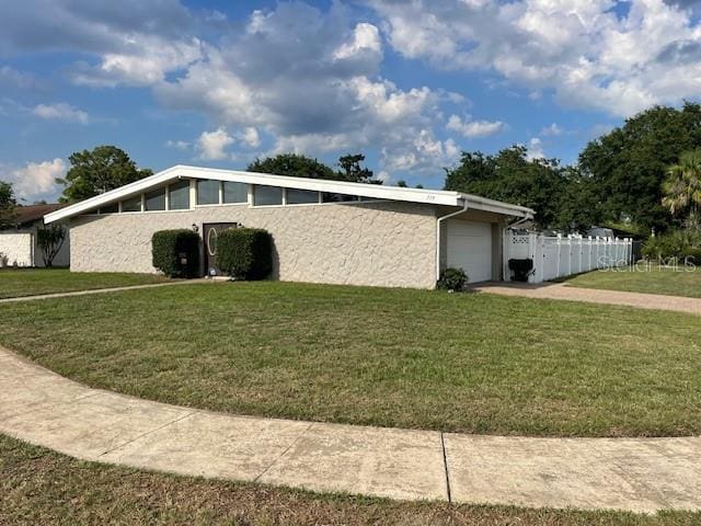 229 Doverwood Rd, Fern Park, FL 32730 - view of property exterior with an attached garage and stucco siding