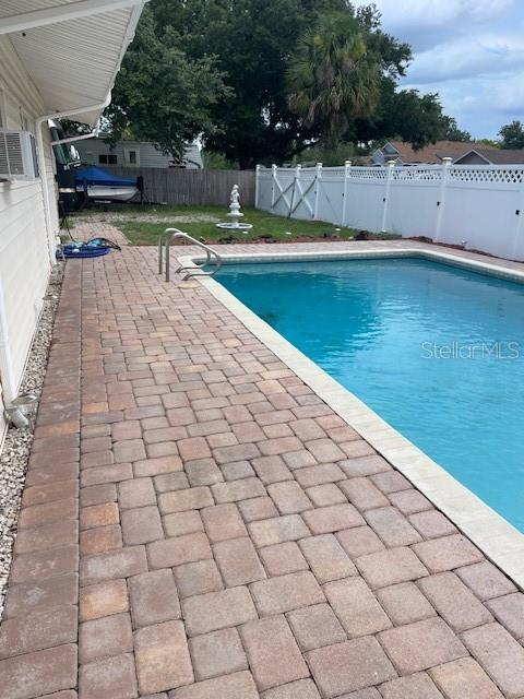 229 Doverwood Rd, Fern Park, FL 32730 - view of swimming pool featuring a patio area and a fenced backyard