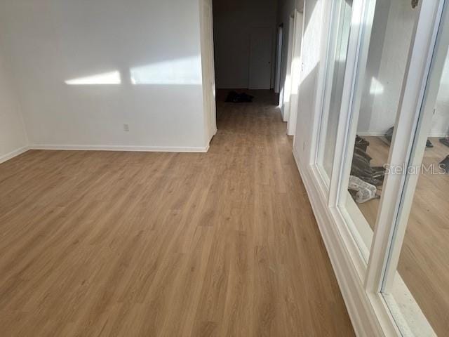 229 Doverwood Rd, Fern Park, FL 32730 - empty room featuring light wood finished floors and baseboards