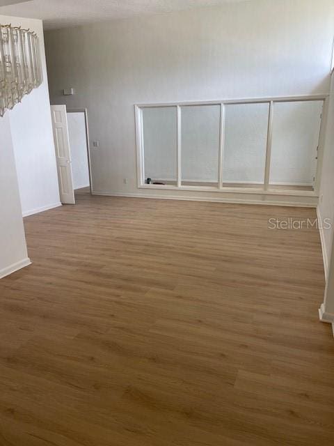 229 Doverwood Rd, Fern Park, FL 32730 - empty room featuring wood finished floors and baseboards
