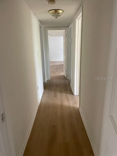 229 Doverwood Rd, Fern Park, FL 32730 - hall with wood finished floors and baseboards