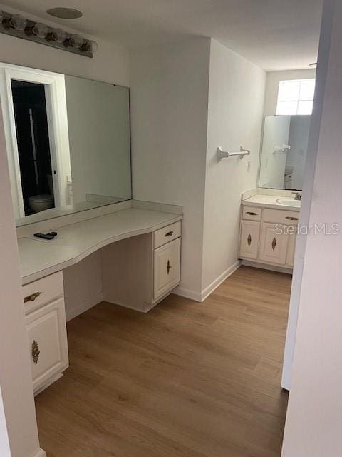 229 Doverwood Rd, Fern Park, FL 32730 - bathroom with wood finished floors and vanity