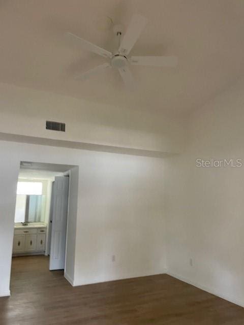 229 Doverwood Rd, Fern Park, FL 32730 - empty room with wood finished floors and a ceiling fan
