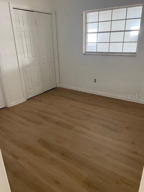 229 Doverwood Rd, Fern Park, FL 32730 - unfurnished bedroom featuring light wood-style floors and a closet
