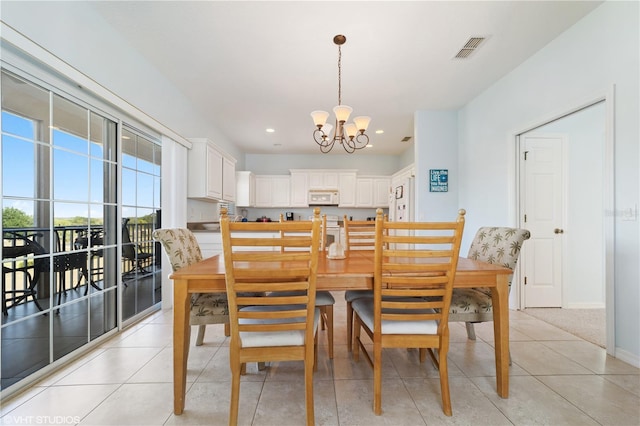 20130 Sunset Landing Ave, Groveland, FL 34736 - dining area featuring a chandelier, recessed lighting, and light tile patterned floors