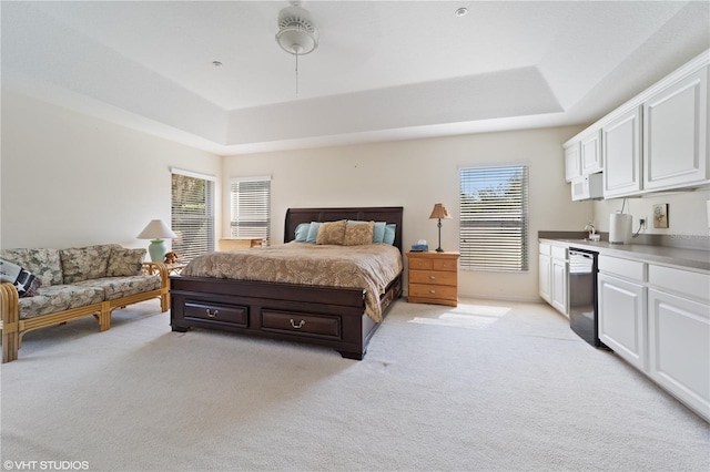 20130 Sunset Landing Ave, Groveland, FL 34736 - bedroom with a tray ceiling and light colored carpet