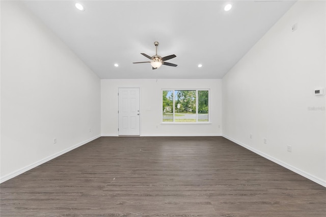 654 NE 130th Ct, Silver Springs, FL 34488 - spare room with recessed lighting, a ceiling fan, dark wood-style floors, and vaulted ceiling