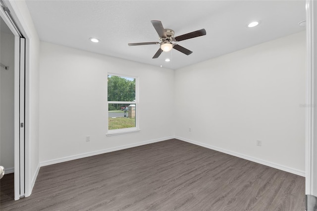 654 NE 130th Ct, Silver Springs, FL 34488 - unfurnished bedroom with dark wood-style floors, recessed lighting, and a ceiling fan