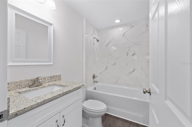 654 NE 130th Ct, Silver Springs, FL 34488 - full bathroom with vanity, shower / bath combination, and wood finished floors