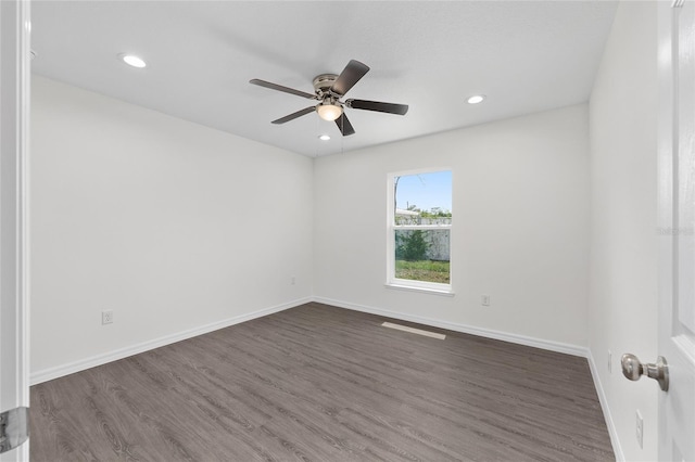 654 NE 130th Ct, Silver Springs, FL 34488 - empty room featuring a ceiling fan, dark wood-style floors, and recessed lighting