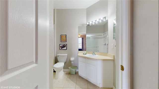 7675 Comrow St Unit 404, Kissimmee, FL 34747 - bathroom featuring tile patterned flooring, vanity, and a shower with shower door