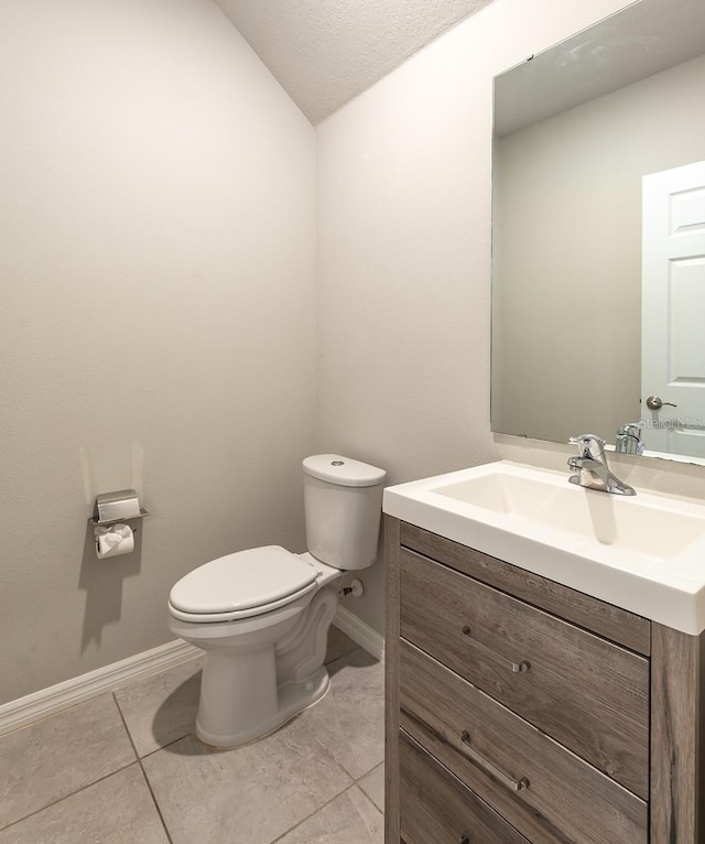 1024 Desert Candle Dr, Ocoee, FL 34761 - bathroom featuring vanity, tile patterned floors, and lofted ceiling