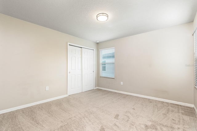 1024 Desert Candle Dr, Ocoee, FL 34761 - unfurnished bedroom featuring carpet floors and a closet