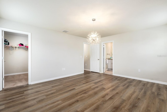 1024 Desert Candle Dr, Ocoee, FL 34761 - unfurnished dining area featuring a chandelier and wood finished floors