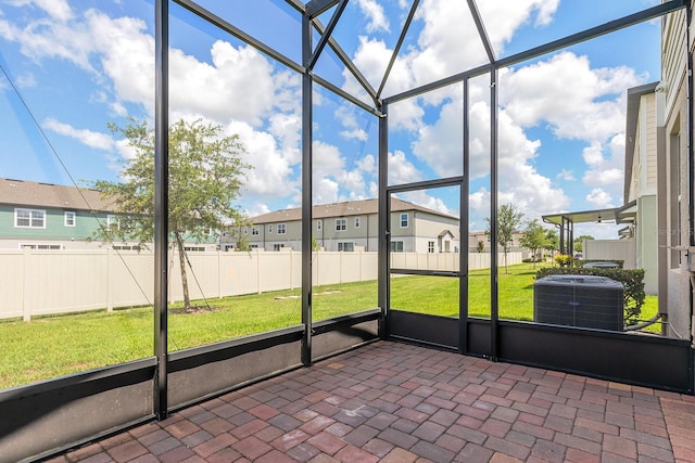 1024 Desert Candle Dr, Ocoee, FL 34761 - unfurnished sunroom featuring a residential view