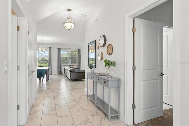 369 Ocean Course Ave, Davenport, FL 33896 - corridor with light marble finish floors and lofted ceiling