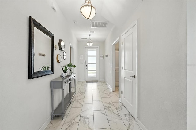 369 Ocean Course Ave, Davenport, FL 33896 - corridor featuring light marble finish floors