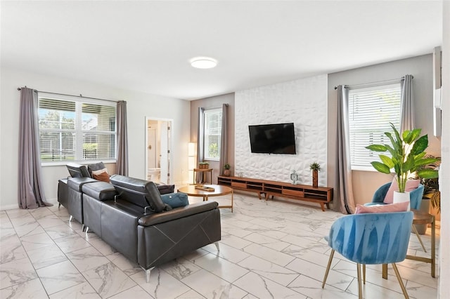369 Ocean Course Ave, Davenport, FL 33896 - living room featuring light marble finish floors