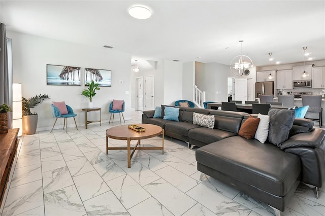 369 Ocean Course Ave, Davenport, FL 33896 - living area featuring light marble finish floors, a chandelier, stairway, and recessed lighting
