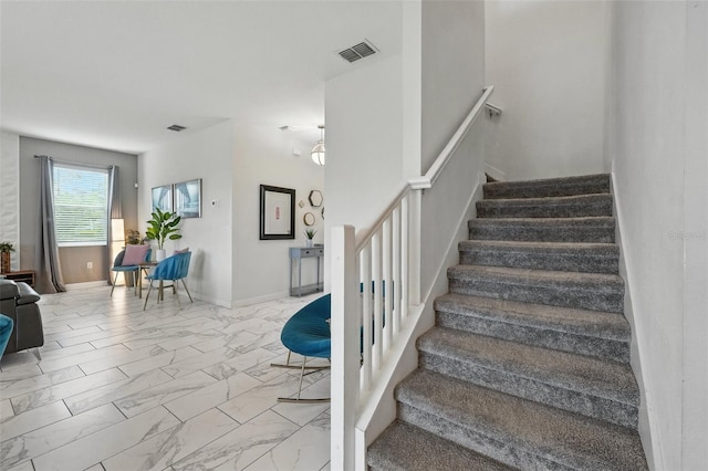 369 Ocean Course Ave, Davenport, FL 33896 - stairs with marble finish floors and baseboards