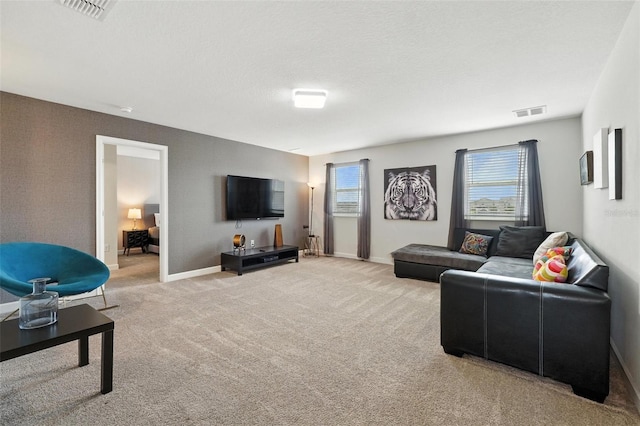 369 Ocean Course Ave, Davenport, FL 33896 - living area with light colored carpet and baseboards
