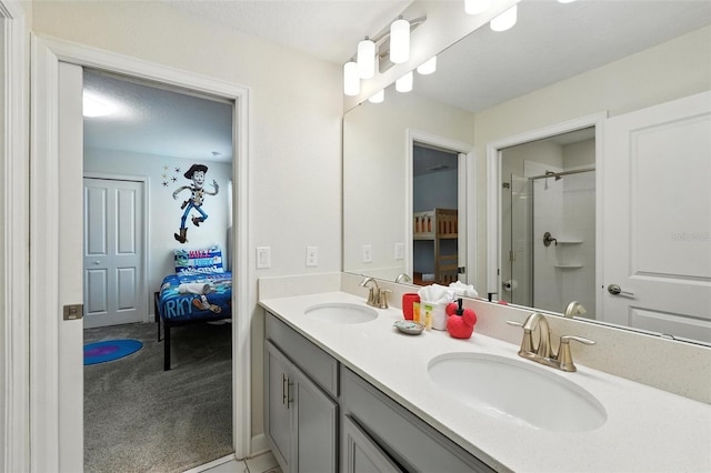 369 Ocean Course Ave, Davenport, FL 33896 - bathroom featuring double vanity and a shower