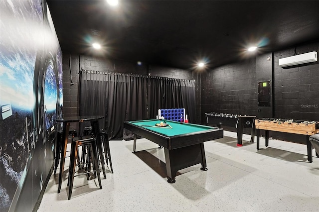 369 Ocean Course Ave, Davenport, FL 33896 - recreation room featuring an AC wall unit, concrete block wall, and pool table