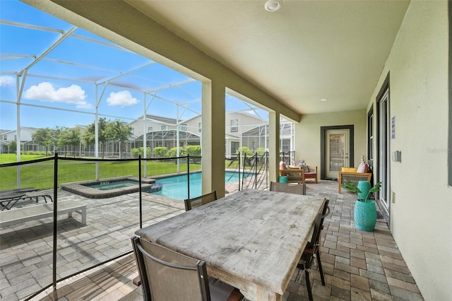 369 Ocean Course Ave, Davenport, FL 33896 - view of patio / terrace featuring a lanai and a pool with connected hot tub