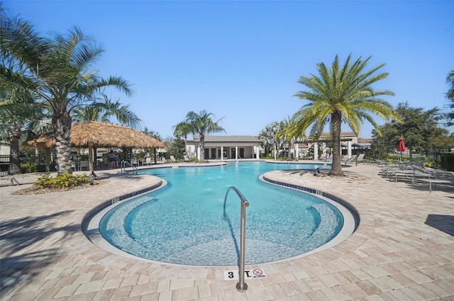 369 Ocean Course Ave, Davenport, FL 33896 - community pool with a gazebo and a patio