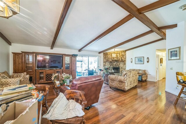 4799 Lighthouse Rd, Orlando, FL 32808 - living room featuring wood finished floors and a fireplace