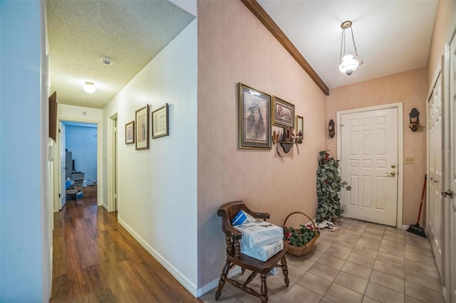 4799 Lighthouse Rd, Orlando, FL 32808 - entrance foyer with a textured ceiling and wood finished floors