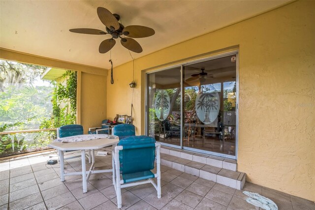 4799 Lighthouse Rd, Orlando, FL 32808 - view of patio / terrace with ceiling fan and outdoor dining area