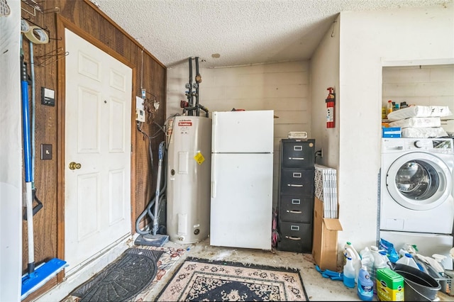 4799 Lighthouse Rd, Orlando, FL 32808 - laundry area with washer / dryer, water heater, a textured ceiling, and wood walls