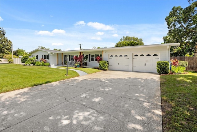 1505 N Lake Mirror Dr NW, Winter Haven, FL 33881 - ranch-style house with a garage and driveway